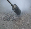 Concrete scarifying using UHP