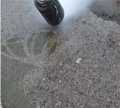 Concrete scarifying using UHP